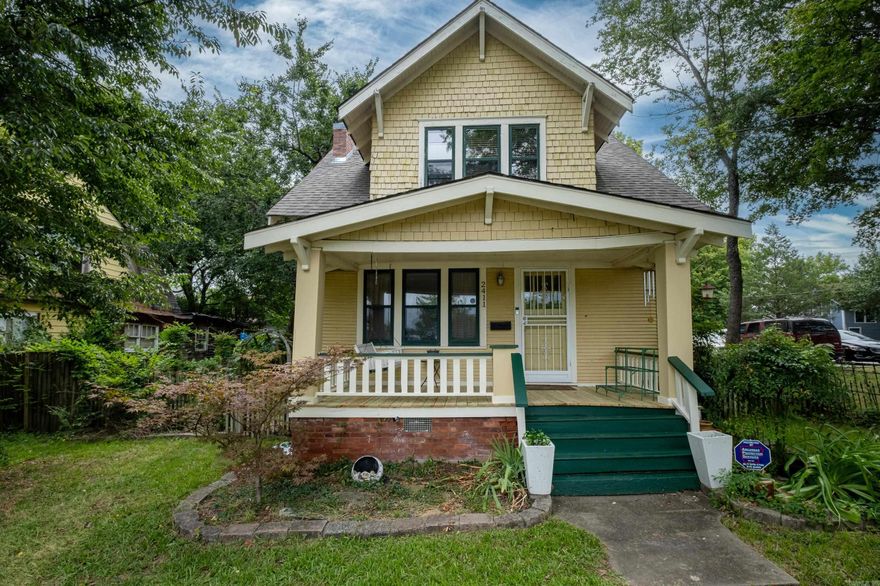 This charming, craftsman home sits perfectly on its high lot along S Izard Street overlooking the neighborhood. Inside you are welcomed by lovely hardwood floors, and a spacious living room that is open to the dining room and framed with french doors. The updated kitchen features solid surface counters and has plenty of space for cooking and entertaining. A half bath and laundry are conveniently located just off the kitchen. Upstairs are two bedrooms, one full bathroom and a cozy home office or hobby room. Outside you will find a covered front porch, rear deck, and large back yard that is perfect or gardening or relaxing. Come see this beautiful home today!