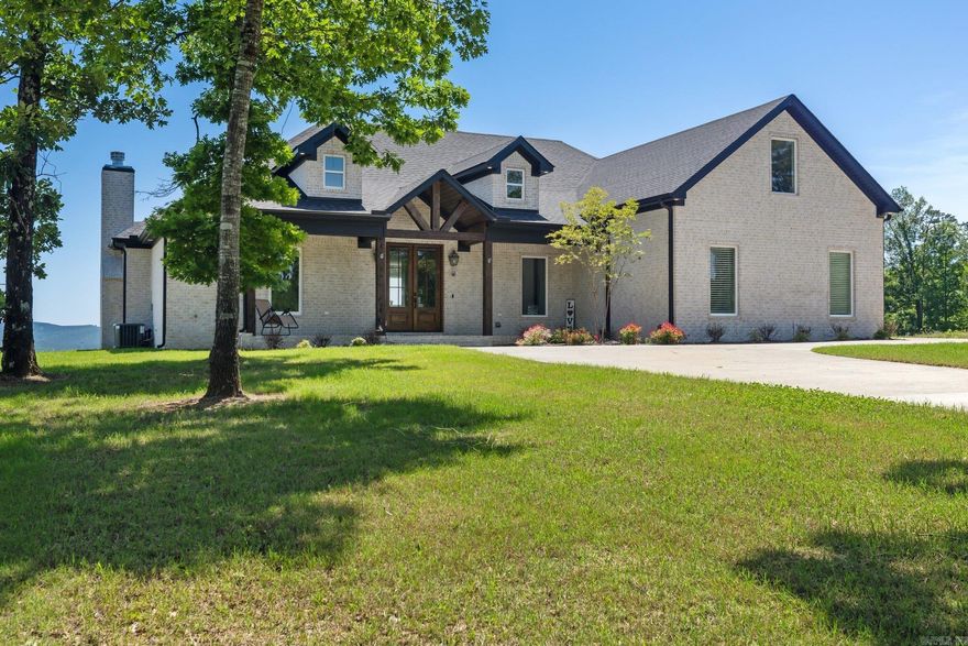 Beautiful home on over an acre of private property with an incredible view overlooking Lake Maumelle and the western mountain range. This estate is just inside the gated neighborhood Lakeview West. The home boast an open floor plan designed to maximize window space allowing tons of natural light into the home while capturing the amazing views. The beautiful home has four bedrooms and three bathrooms as well as a spacious living and eating area off the kitchen. The home also has a large utility room and a large bonus room upstairs. The home sits on rare property as it not common to have an incredible view while still having the luxury of a large flat backyard. This is truly a unique estate.   For VA loans this home has an assumable loan at 4.5%. Call for details!