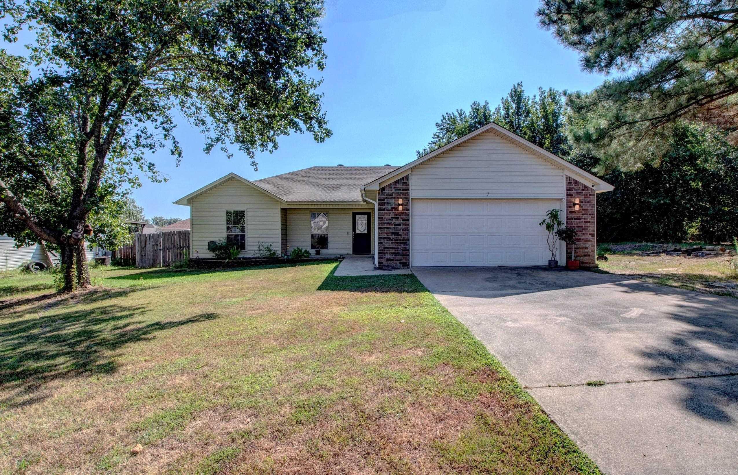 Welcome to this charming 4-bedroom home with a thoughtful split floor plan that offers both privacy and flexibility. One of the bedrooms is perfectly sized to be a home office, nursery, or craft room ā giving you space that adapts to your lifestyle. The large living room is the heart of the home, featuring a cozy fireplace and a tray ceiling that adds warmth and character. The primary suite is complemented by a spacious bathroom with a separate shower, relaxing tub, and a walk-in closet for all your storage needs. Step outside and enjoy a sizeable backyard, perfect for gatherings, playtime, or just relaxing in your own private space. The quiet street ends at the lot, creating a peaceful setting that feels tucked away while still being convenient. Located in the desirable Cabot School District, this home combines comfort, function, and location ā making it the perfect place to call home. Agents please see remarks!