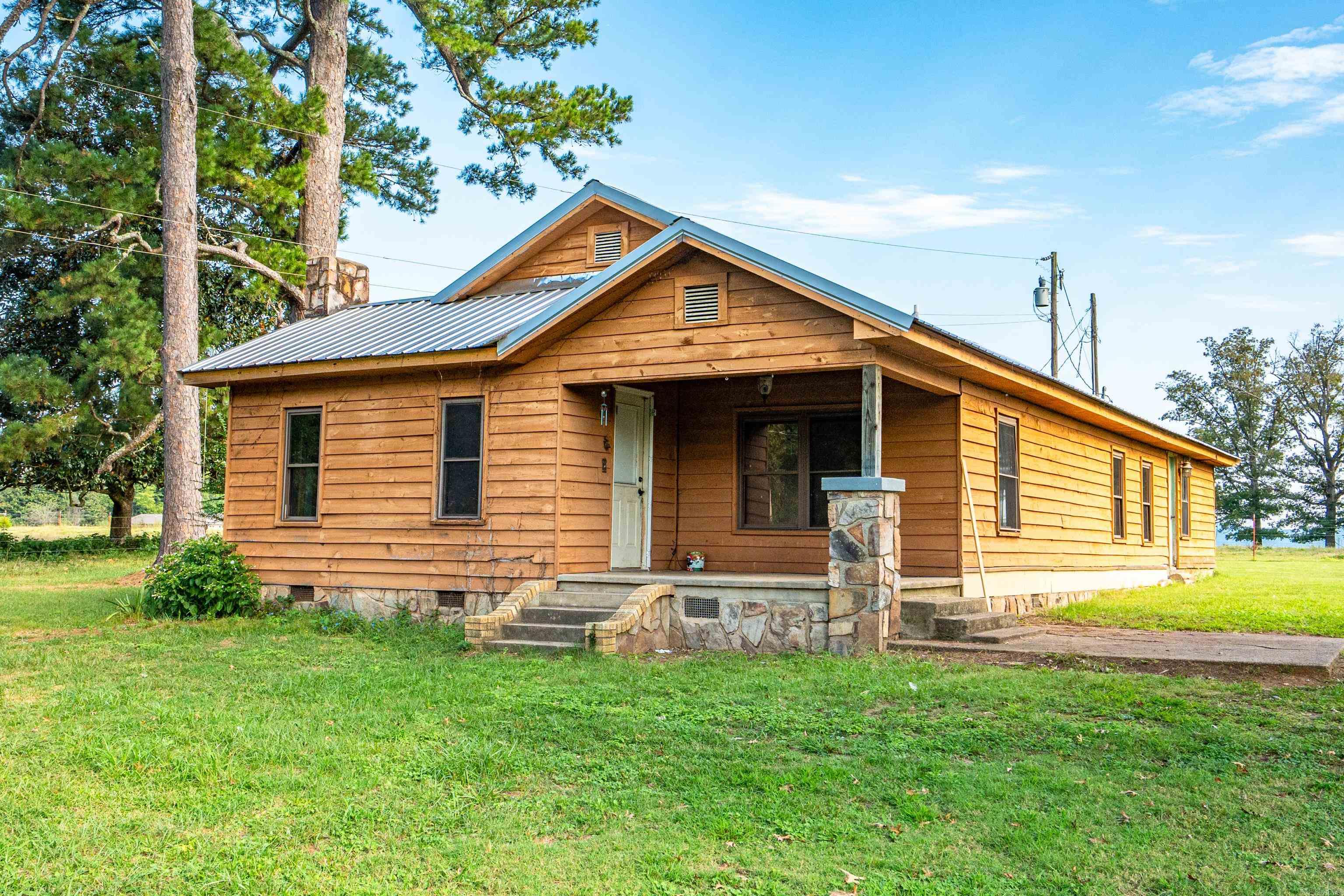 Charming 3-bedroom, 2-bath home nestled in the heart of Oden, AR! This cozy property features a spacious living area complete with a wood-burning stove, creating the perfect warm and inviting atmosphere. The home showcases a rustic wood-burning style floor, adding character and charm throughout. Enjoy comfortable bedrooms, functional bathrooms, and a layout ideal for everyday living or weekend getaways. Conveniently located right off Hwy 88, this property offers both privacy and accessibility. Donāt miss the opportunity to make this home yours!