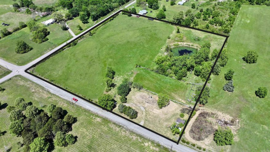 Exciting Property Opportunity at 155 Bliss Road, Judsonia -  This exceptional property is located at 155 Bliss Road in Judsonia.  This property aligns with  investment interests and offers a unique combination of features and potential. key highlights below: Property Showcasing Exceptional Features: *   Inviting Fishing Pond: Perfect for relaxation and recreation, providing a tranquil setting. *   Established Homesite with Chimney: Offers the foundation for a comfortable residence, with an original architectural element. *   Functional Utilities: Equipped with a water meter, water lines, a septic system, and a power meter, ensuring convenience. *   Optimized Infrastructure: Features multiple driveways, providing easy access and versatile parking options. *   Well-Managed Land: Complete with fencing and multiple livestock pins, suitable for various agricultural or recreational pursuits. *   Productive Land: Encompasses a pasture and hay field, ideal for livestock or agricultural endeavors. *   Cultivated Spaces: Includes a garden area, perfect for fresh produce or landscaping dreams. *   Mature Landscape: Boasts large shade trees *   Beautiful sunsets overlooking neighboring lands