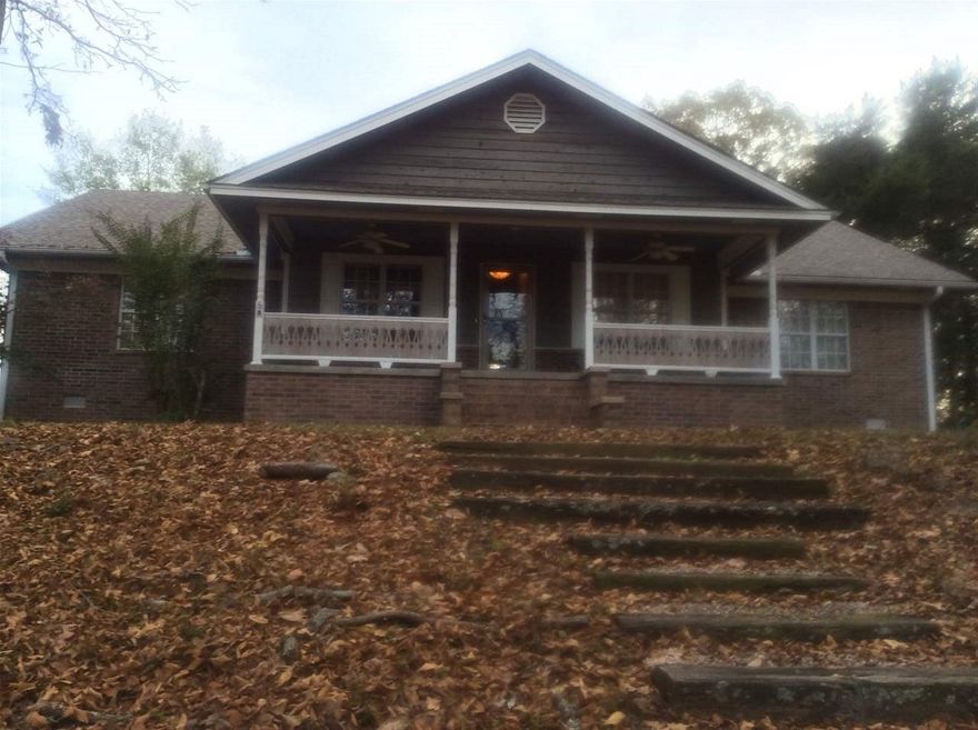 Beautiful 4 bed/3 bath brick home on 9 acres M/L. There's a 450 sq./ft. 1 bed/1 bath apartment & 48x30 shop. A nice deck overlooking the in-ground pool. Hey horse people, there's nice pastures, a huge barn & a stocked pond so bring your horses. Tons of updates & is very open & neutral. The wood burning fireplace is a wonderful addition in the huge living room w/ vaulted ceilings. Large master & master bath has his & hers walk-in closets, dual vanities, & separate tub & shower. Garage is used as a playroom.