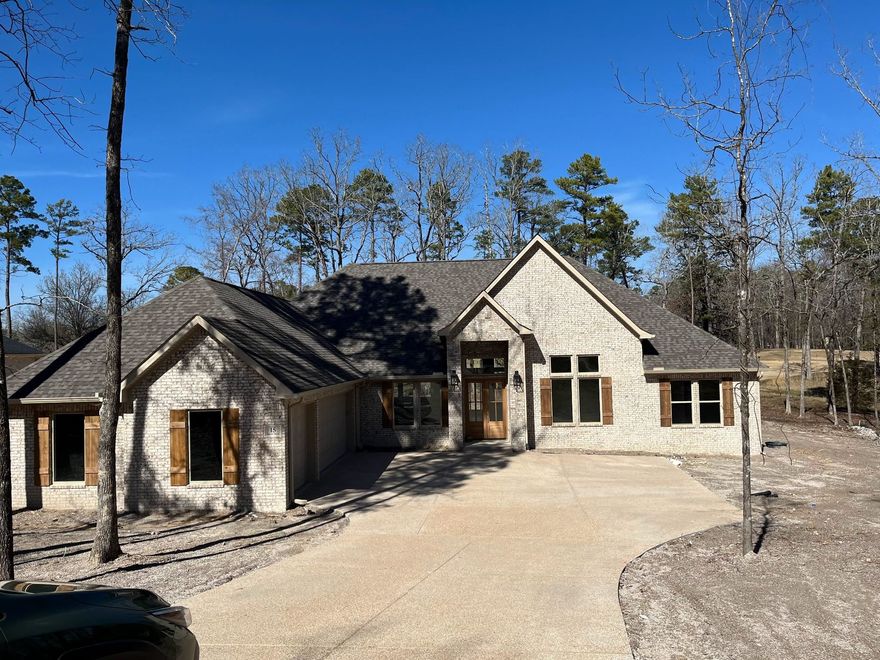 BUILDER WILL PAY DIAMANTE CLUB DUES FOR 3 YEARS, A $30,000.00 VALUE. A great combination, Diamante\s award-winning golf course and rated in the top three in Arkansas and award-winning Carriage Homes 7-time homebuilder of the year in HSV.  If you want on the course with a view, try this one out.  Many of the Diamante promotional pictures are shot in the back of this house on the#11 Fairway. That's how good the view is!  This 3 BR, 2 1/2 Bath, 3 car garage is just as stunning as the view.  Decorated in the latest neutrals with a bar in the kitchen big enough to sit 6-8 of your closest friends so they too can enjoy your view.  Gorgeous primary bedroom and bath with huge walk-in closet.  Storage galore including a walk- up staircase with storage in the attic. Bring the family and friends over and let them enjoy your private country club.  They can play three rounds of golf a month free.  Of course, you can play everyday!
