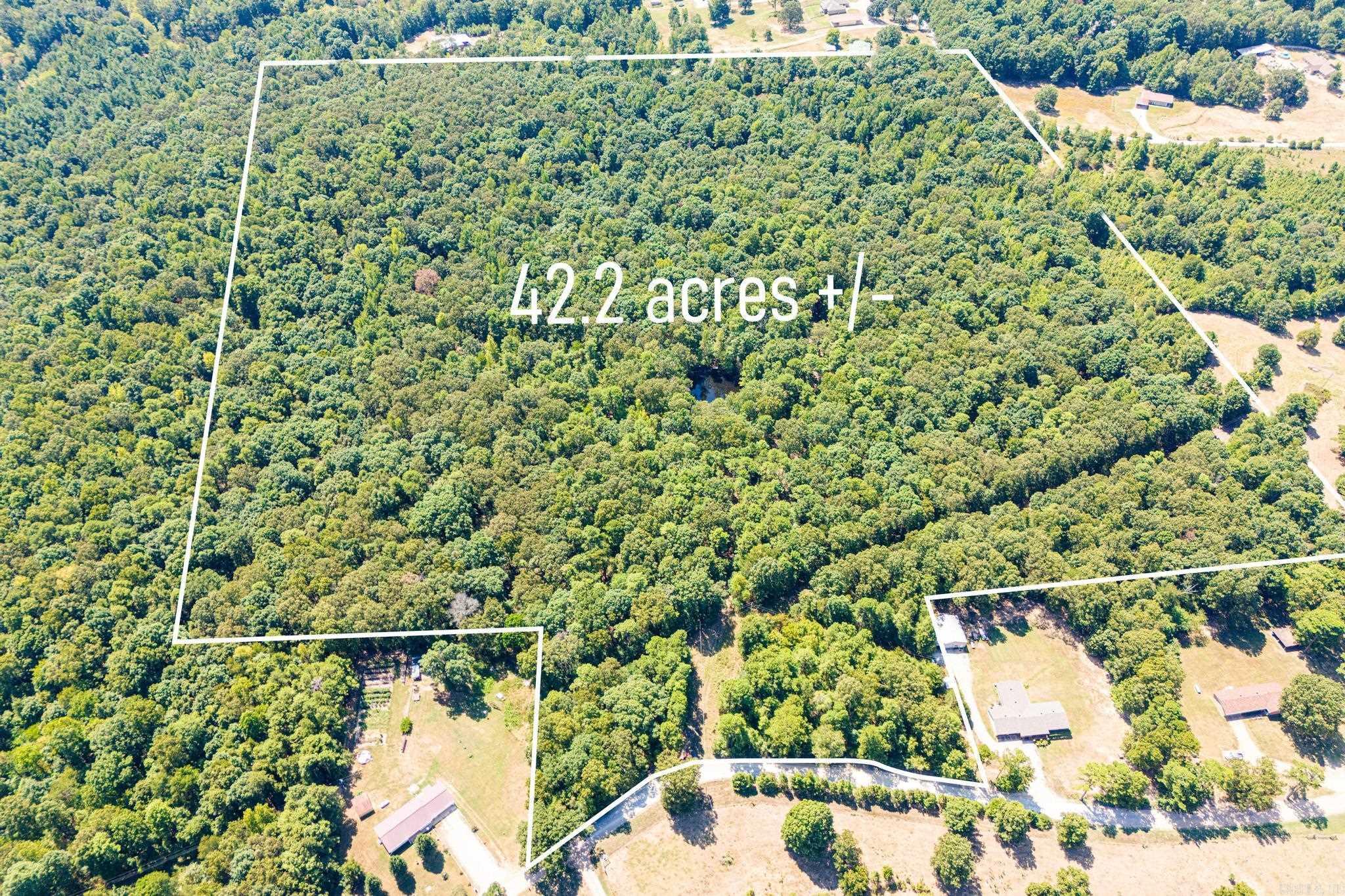 Discover 42.2 acres of rolling, wooded land in Greene County, offering both privacy and natural charm. Located near Crowley’s Ridge State Park and the Ridge Retreat & Adventure Center, this property is perfect for nature lovers and outdoor enthusiasts. With abundant deer, scenic views, and a pond, it is deal for a private retreat, investment opportunity, hunting land, and so much more. Explore this serene property today!