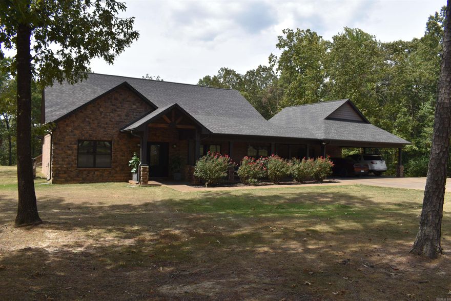 • 4000 +/- Square foot custom home • 5 bed 3 bath • 38 +/- Acres • 40x60 heated and cooled shop with full bath • Private setting • Paved road frontage • Commercial grade kitchen appliances • Huge family room great for entertaining guests • 10x12 safe room • Laundry Room and Pantry • Attached three-car carport • Beautiful stone and brick exterior • Covered front porch • Spacious covered back porch • Hot tub • Above Ground Pool • Backup Generator • Gated entry • Two overhead doors on shop • Two post car lift and Air compressor • Covered work area in front of shop • 60x80 Pole barn with Camper Hookup • Mature Hardwood timber • ATV trails • Great deer and turkey hunting • Adjoining acreage currently available • Less than 30 Minutes from Russellville