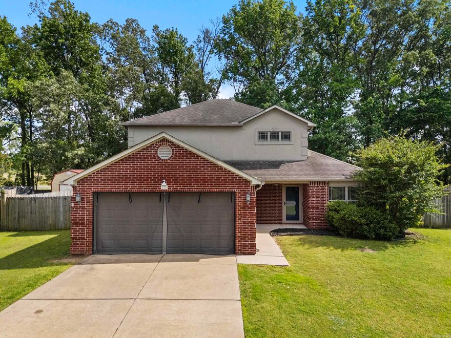 This three bedroom, two and a half bath home sits on a large privacy fenced in lot. Large primary bedroom has a ensuite bath downstairs. Upstairs has two large bedrooms, full bath and a large bonus room. Huge closets throughout the home. Eat-in-Kitchen with quarry tile. Separate laundry room. Partially floored attic. Epoxy garage flooring. Very Spacious home!