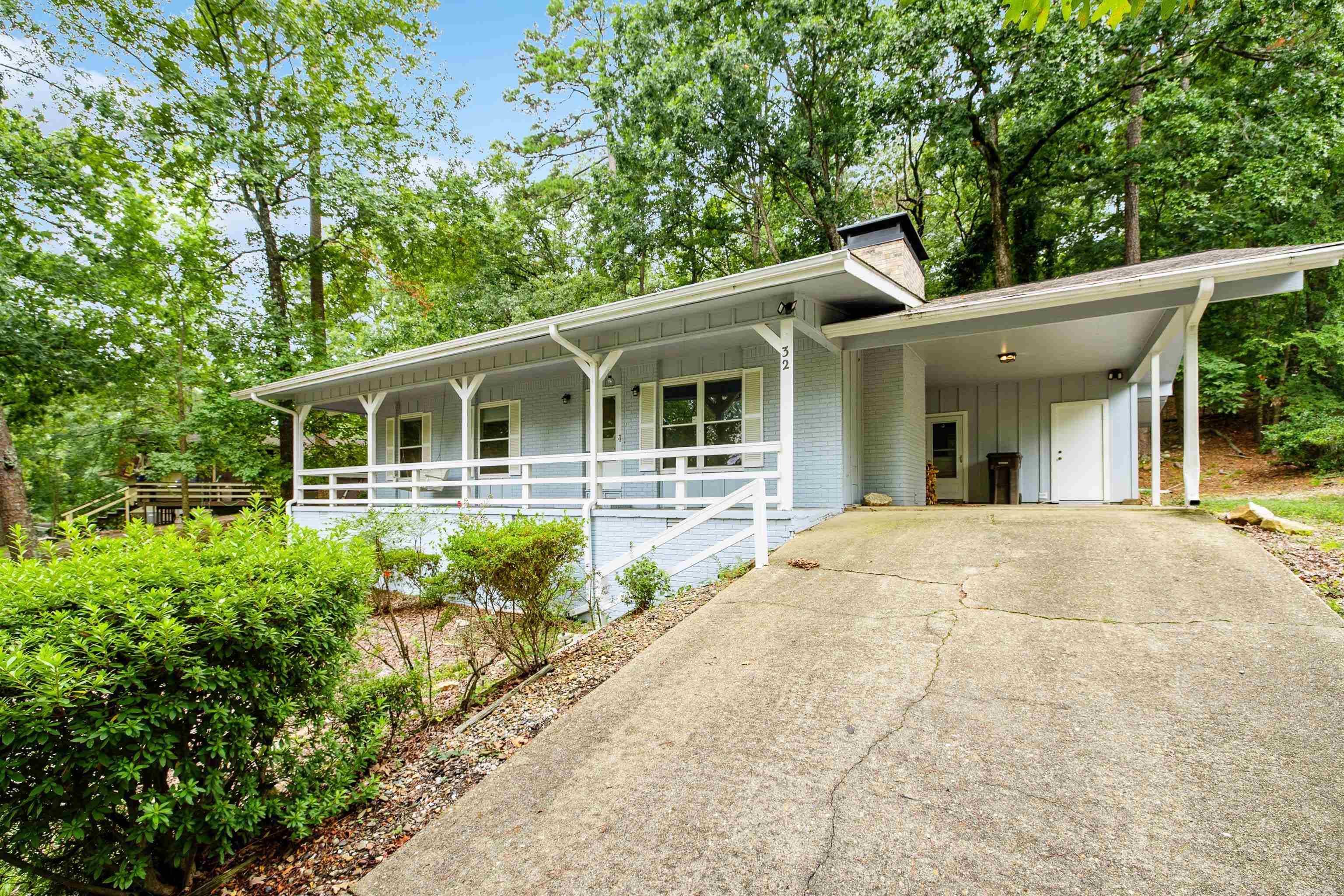 Motivated Seller, bring your offer! This recently remodeled, 3-bedroom Hot Springs Village next to Lake Desoto offers expansive living spaces both indoors and outdoors, featuring a covered back patio! With its vaulted ceilings in the living room, carport, workshop, and ample storage, this single-story home has everything you need. The extended front porch provides a lovely view of Lake DeSoto. Plus, it's just minutes away from all the West Gate amenities, including golf, trails, lakes, marina, swimming beach, and more! Schedule a showing today!