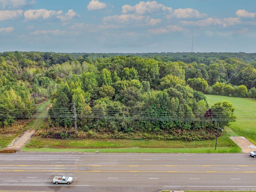 Welcome to Market 4.59 +/- acres of timberland on Hwy 1B in Forrest City, Arkansas. Excellent C-2 frontage and visibility opportunity along a major corridor connecting I-40 and downtown Forrest City. This prime piece of property is ready for development with 300 +/- linear feet of paved road frontage and estimated daily traffic counts of 11k+, and city utilities available nearby. Conveniently located near favorite local amenities, major transportation routes and just 45 miles from Memphis, TN and 90 miles to Little Rock, AR. Additional acreage available. Call today to schedule your private tour and make an investment in tomorrow by securing a versatile tract in one of Forrest City’s most visible growth corridors.