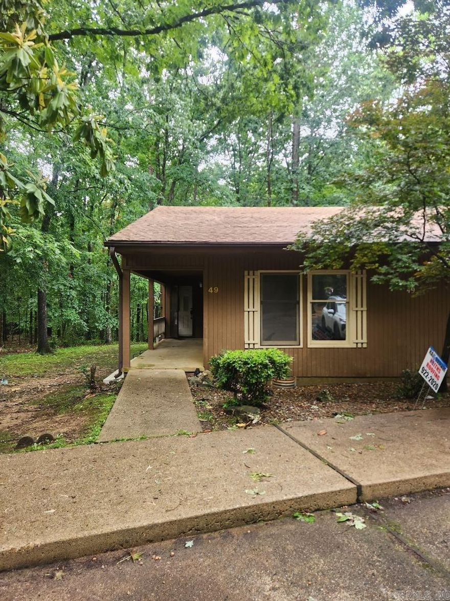 This desirable 3BR, 2BA one-level . House , all areas have been addressed and in great working condition. End of Culdesac. It is tastefully updated w/a New Roof; Move-in Ready for living in or Turn-key Open floor plan with an airy kitchen with breakfast bar, living room with a cozy fireplace, low maintenance LVP & tiled floorings & soothing modern lighting & fixtures. It is conveniently located near lake & marina, golf course, walking trails, swimming pool, basket ball & pickle ball courts, shops & restaurants. This End-unit townhouse with a spacious sundeck offers additional privacy & extra large green yards for outdoors living & games; suitable for family and guests of all ages. A $2,000 one-time HSV buy-in fees for first time buyers within the past 12-months which will be collected at closing. See Agents Remarks.