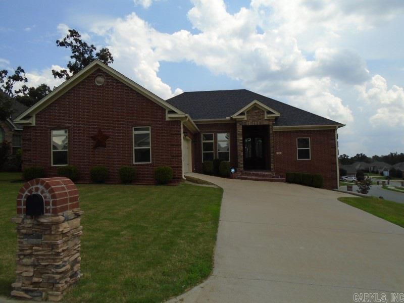 4 Bedrooms, 2.5 Baths, split floor plan, formal dining open to den and kitchen, scored and stained concrete flooring, slab granite all counter tops and vanities, blinds, ceiling fans, covered patio, fenced backyard, large corner lot, gas connection for grill, SS appliance include stove, microwave, dishwasher and frig. Gas log fireplace, breakfast bar, eat-in kitchen, all brick exterior with siding on framing. All one level. Move-in ready.