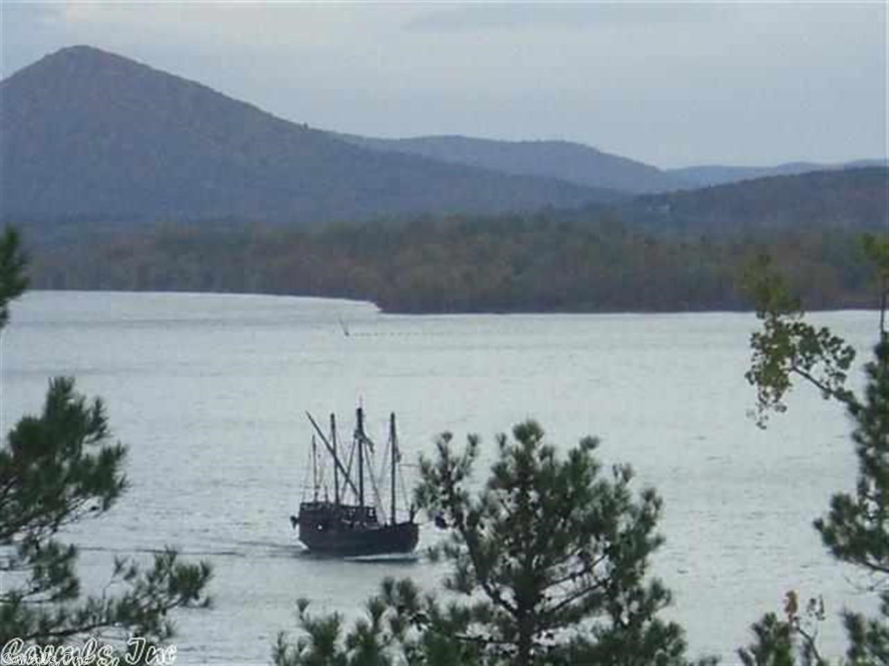 Build your Dream Home!! This amazing tract of land has a view of the Ar River, Pinnacle Mt, Chenal Towers and Mountain Ranges. Fabulous Sunsets!! It comes with all underground utilities to include; water, electricity, gas, ATT with DSL and sewer. Minimum sq ft requirements are 2500 sq ft. If you can't find the perfect home design and build your perfect home your way. Watch the eagles soar and enjoy the tranquility of this quiet and peaceful neighborhood. Also proposed to soon be gated.