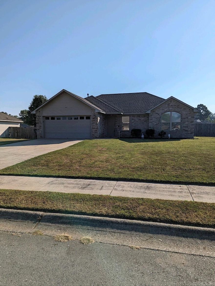 Great home with new paint and carpet throughout PLUS an extra-large lot fully fenced!!! Popular split bedroom floorplan.  Corner fireplace in living room!  Separate laundry room! Nice walk-in closet and double vanity PLUS jetted tub in primary.  Refrigerator to convey at no value.  A MUST SEE!  NOT MANY IN THIS PRICE RANGE!  Clouded Window on front of house is on order and will be replaced.