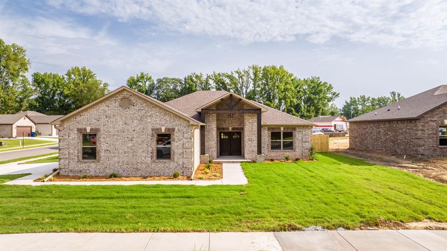 Great 4 Bedroom,2 bath,open floor plan w/side load garage. Crown molding,tumbled stone backsplash,kitchen pantry, granite,under cabinet lighting,ceramic floors in all wet areas,&GE appliances throughout. Kitchen offers an island w/plenty of storage & gorgeous granite. Master has double sink vanity,large walk in closet w/built in shelving. Exterior will be sodded & landscaped. Home includes ceiling fans in all rooms. Pictures are of model home. Pick your colors and finishes today!