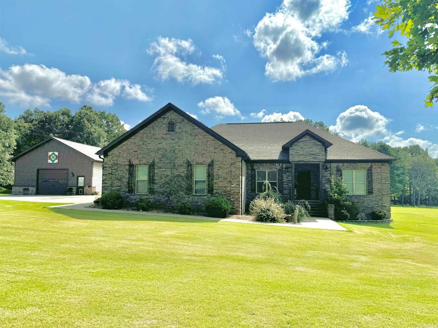 This immaculate BRICK HOME sits on 4.5 acres and offers a perfect blend of comfort, luxury, and functionality! The open concept living space is ideal for modern living, featuring a custom kitchen equipped with beautiful alder cabinets, quartz countertops, stainless appliances, a cozy breakfast nook, and a spacious open dining area. The master suite offers a large bedroom with access to the back patio, walk in shower, jacuzzi tub, and large walk in closet. Located off the back patio is an in-ground saltwater swimming pool, complemented by a pool house that includes a fully equipped kitchen, bathroom, and secure safe room. The home has an attached two vehicle garage with additional storage above and a detached garage with a lean to. Conveniently located on a paved road in a prime location, this property is a rare find! Don't miss out on the opportunity to call this property HOME!