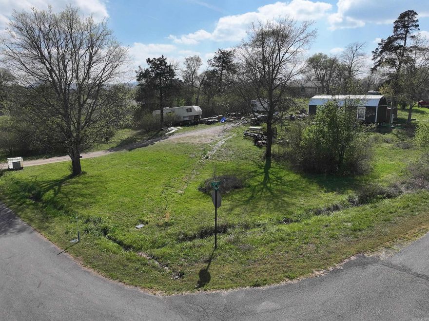 0.35 +/- acres of cleared and leveled land in Montgomery County. The property is equipped with city water, electricity, and sewer, offering a ready-to-build site for a variety of permitted uses, including residential construction or other approved improvements. A manageable, well-prepared tract with essential utilities already in place. The property is currently occupied, but all items including the building on the property will be removed before closing.