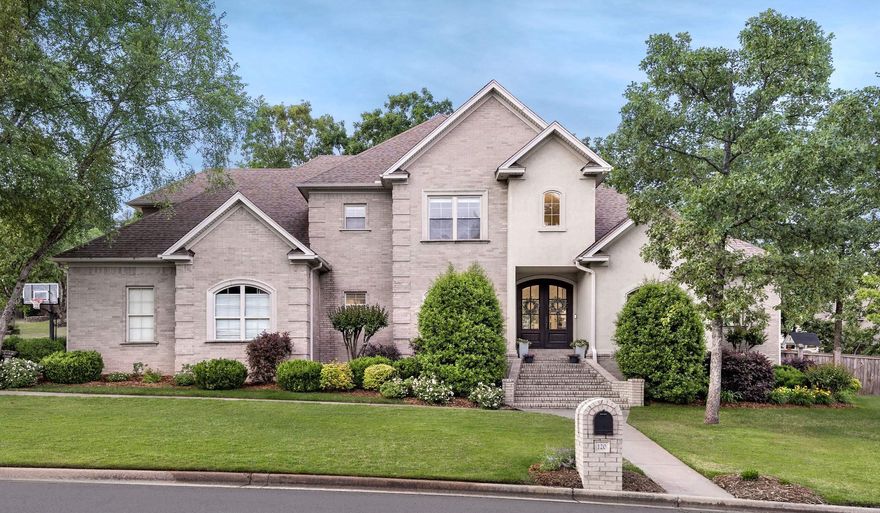 Custom-built home on a flat corner lot in Chenal Valley, beautifully remodeled with an exceptional floor plan. The two-story entry opens to a spacious living room with gorgeous fireplace. The chefās kitchen has been completely updated with new appliances, including gas cooktop, warming drawer, panel-front dishwasher, and 42ā panel-front Monogram refrigerator, plus a stunning 10-ft oak island with quartz countertops perfect for entertaining. A large great room off the kitchen features a smart-enabled electric fireplace and media center, opening to a screened-in sunroom with porch swing bed. The main level offers a luxurious primary suite with a custom walk-in closet and beautifully remodeled marble bathroom featuring a freestanding tub and walk-in shower, plus a guest suite with full bath. Upstairs includes three bedrooms, two full baths, and a game room with a built-in castle play area. Excellent storage throughout, including a heated/cooled closet and walk-in attic. The oversized side-load three-car garage, fenced yard, professional landscaping, and custom playhouse or garden shed complete this special property. Refinished hardwood floors, new lighting, and fresh paint throughout.