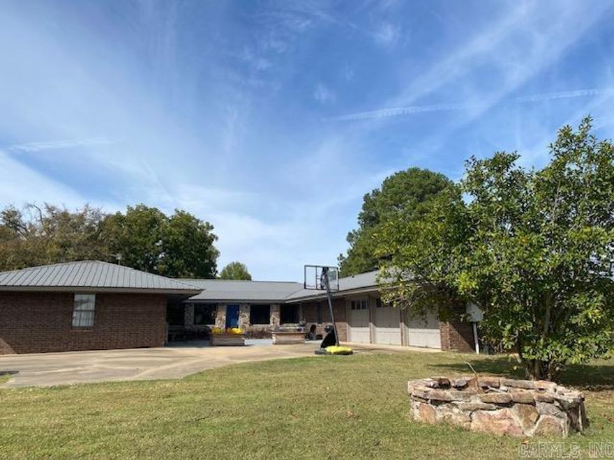 Spacious mulit-family home that sits on the front of ten acres. This home has been completely remodeled and is move in ready.  2,000 sqft Brand NEW shop with two bays, and apartment/man cave.