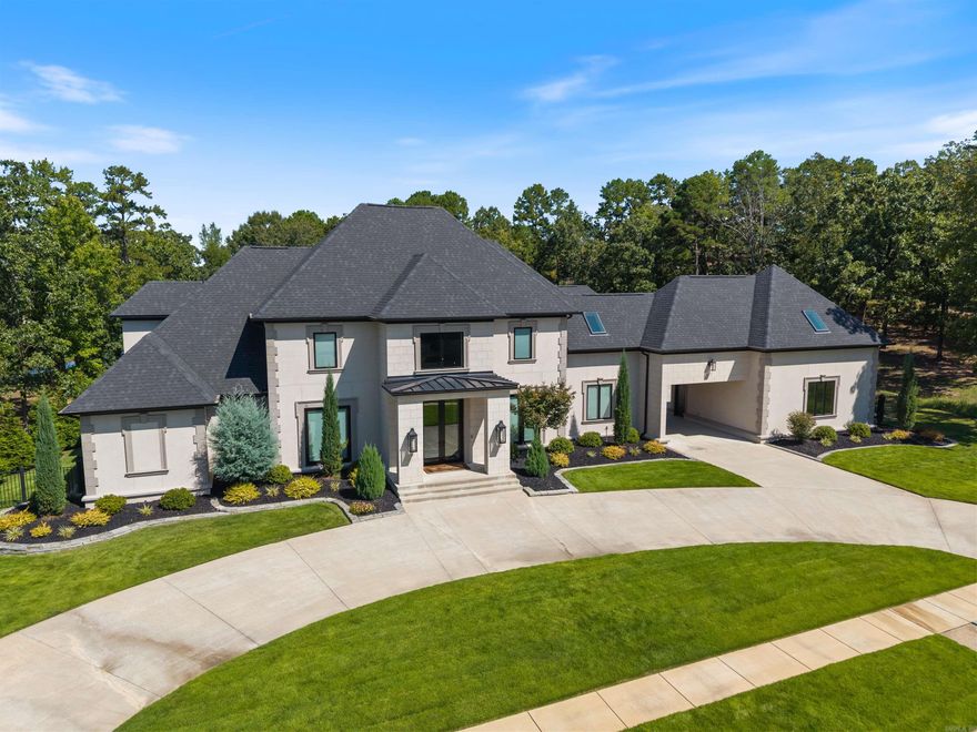 Stunning estate tucked within the prestigious gated neighborhood of Valley Falls Estates. Situated on nearly an acre, this home was reimagined in 2022 with a complete renovation blending timeless architecture with modern excellence. A two-story entry opens to the dining and great room. A hearth room is open to a chef’s kitchen boasting Thermador appliances: built-in coffee maker, gas range, convection & steam ovens, microwave, two dishwashers, a 92-bottle wine tower, & Sonic ice machine, along with dual islands, custom cabinetry & built-in dual refrigerators, freezer. The main-level primary suite offers a spa bath with infrared sauna, dual vanities, makeup space, sitting room, & a spacious closet. A guest bedroom suite is also on the main level. Upstairs features four bedroom suites, a game room with wet bar, half bath, & home gym. Enjoy the outdoor retreat featuring a new pool and spa with heater & chiller, cool decking, sport court for pickleball & b-ball, firepit, composite decking, plus more. Features include new Pella windows/doors, 3 laundry services, spray-foam insulation, Control 4 home automation, new roof, and new HVAC/ductwork with individual bedroom climate control.