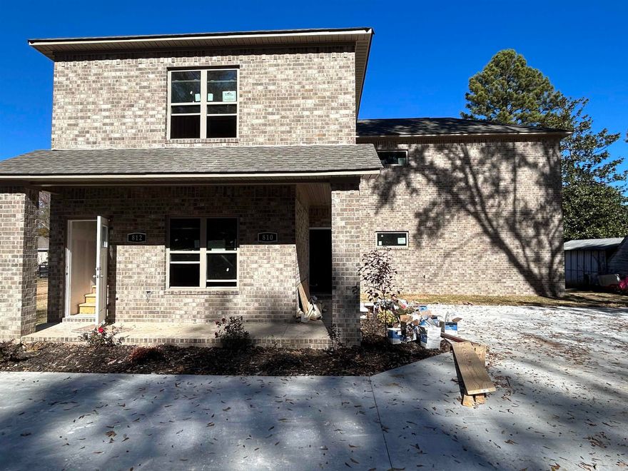 NEW BRICK DUPLEX!!! Convenient to all the things! Go right to get to 67/167, go left to access 440, and two easy routes to Little Rock Air Force Base within minutes! This duplex is like one 3bed/2bath house stacked on top of the other. R door goes to downstairs and L door opens to stairway to upstairs. Perfect for renters or owner/occupants! Full waterproof vinyl throughout, full laundry, granite countertops, two rooms  with walk-in closets! Construction due to be completed in time for the new year! Matching duplex behind this one is also listed: 819 & 821 Ellis Street MLS #