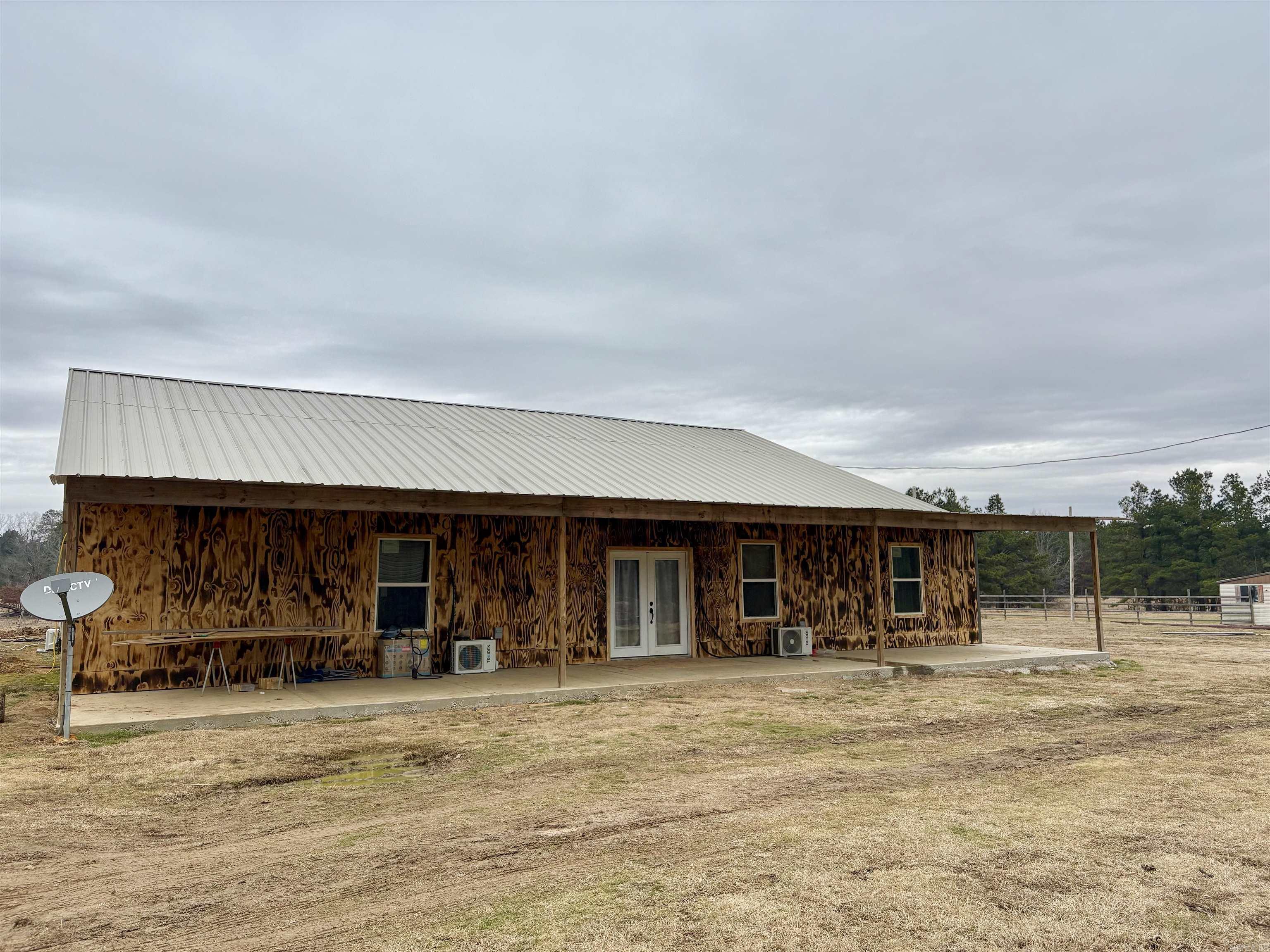 Major price change!! New construction home with 4 bedrooms/ 3 baths, a shop & 39 acres!! Open floor plan kitchen, dining and living room. Pantry in the kitchen and a separate laundry room just outside the kitchen. Electric range, two tankless gas water heaters and 6 mini split units. Large bedrooms and bathrooms & each bedroom has a spacious closet. Outside you'll find a fenced pasture and nice pond. The mobile home on the front of the property will be moved. You can't build for this price! Take a look and have your own piece of paradise.