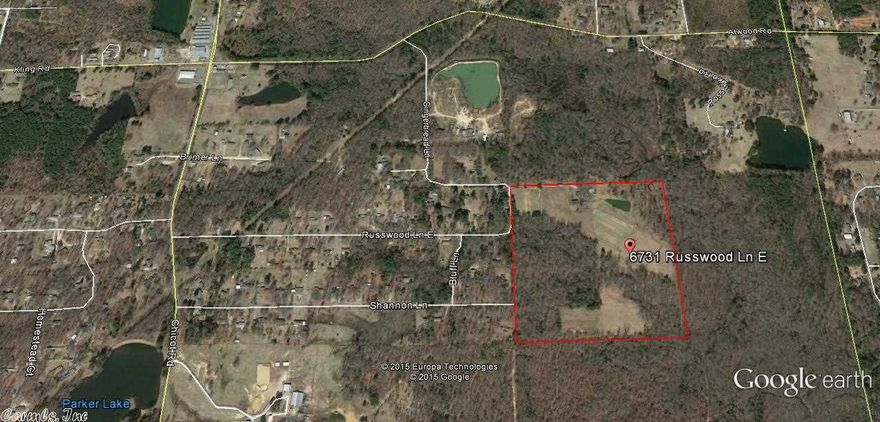 Perfect opportunity to develop or live in peace on 40 acres (2 parcels) approximately 17.5 acres of Pasture land and 22.5 of Timber with approximately 420' of road frontage.  City water and electricity are on the property.  An older mobile home, outbuildings and barn convey.