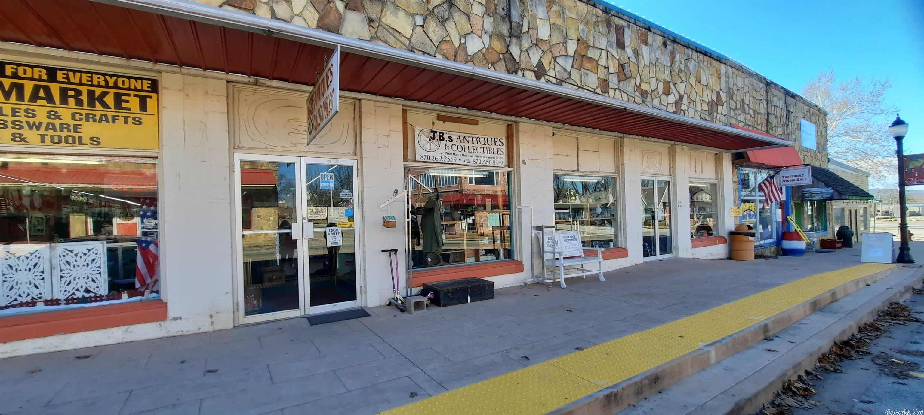 Opportunity is knocking, take a look, a going business, two for price of one, property offers large parking in back and street parking in front. 2 buildings, both are used as one business now, but could be used separate. 2 restrooms, shelving and some equipment included, a must see to appreciate location and the thriving business.