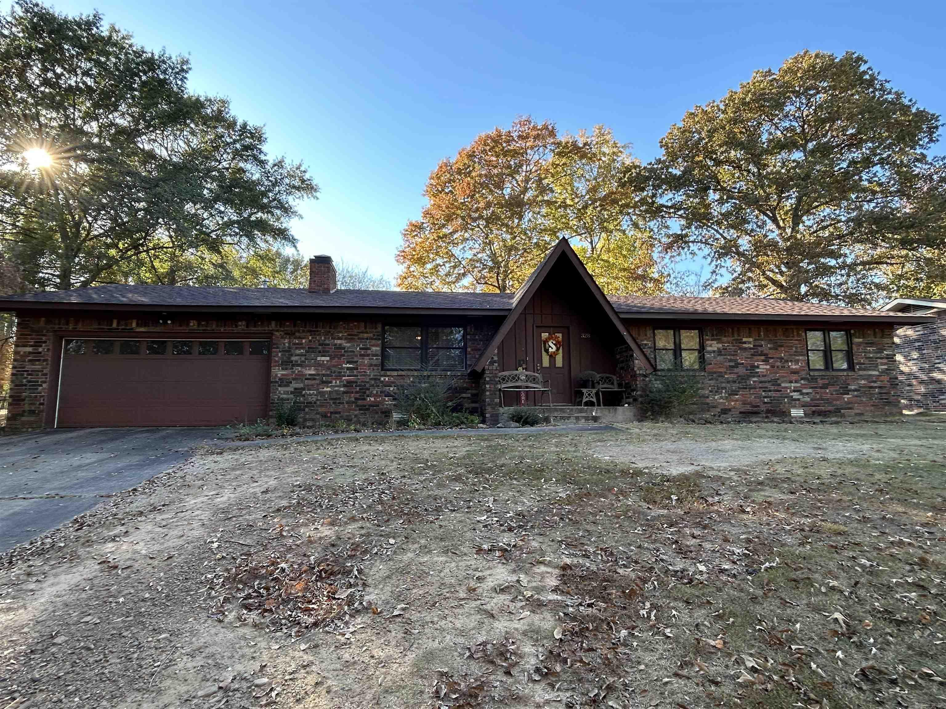 This is find! Just a short walk from the Clinton schools, and historic downtown Clinton....this move in ready home is ready for its next family. It is a well-kept home that has had recent updates and lots of beautiful modern designs. Imagine sitting on your covered back porch relaxing as you enjoy your large fenced in backyard. Inside you will find that the seller has shown a special love of this home. This is evident in the condition, updates, and design. In the winter, enjoy a nice crackling fire in your wood burning stove. There are three sizable bedrooms and two full bathrooms along with a large laundry room, attached garage, outdoor storage building, and plenty of space for your family. The location offers an easy walk to school, making it very convenient for parents who occasionally have to leave for work early. The kitchen is absolutely beautiful with recent updates and modern touches. This is a rare find under $200k in Clinton, so don't delay. Schedule your showing today.