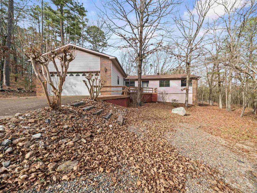 Bring your vision and make this home shine! Tucked away on a quiet cul-de-sac in beautiful Hot Springs Village, this 3-bedroom, 2.5-bath home offers a solid layout and great bones- ready for your updates and personal touch.