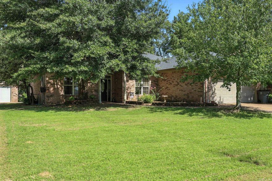 Charming 3-bedroom, 2-bath brick home offering approximately 1,800 sq ft of living space. The floor plan includes a functional kitchen, spacious living area, and comfortable bedroom layout. Enjoy outdoor living from the front porch and back patio. Recent updates include a new HVAC system for added efficiency and comfort. A detached 2-car carport and exterior storage area provide convenient parking and extra space. Located at 1313 Richard Street in Hot Springs, this property offers a great opportunity for homeowners or investors alike. Square footage is approximate.