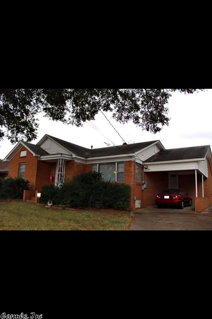 Very nice home in great location in Morrilton. Fresh paint throughout the house.  Beautiful hardwood floors, top of the line kitchen was remodeled to perfection last fall and includes all new stainless appliances.  Storage building in the back that is bricked to match the house.  Large screened porch perfect for your summer time entertainment.  ***AGENTS SEE REMARKS***