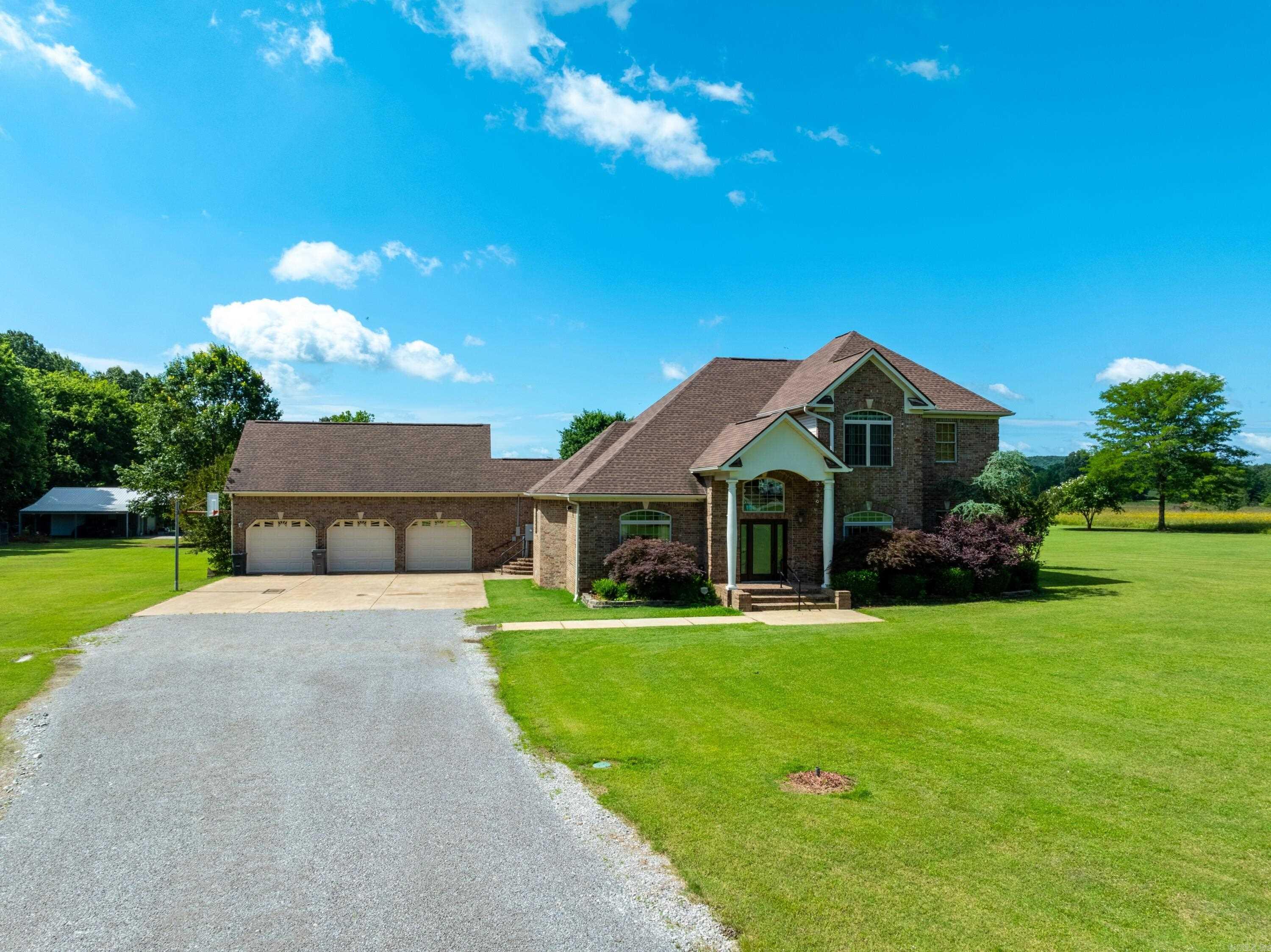 Stunning Custom Brick Estate on 4+/- Acres in Batesville, AR 4 Bed | 3.5 Bath | 3-Car Garage | Approx. 3,045 Sq Ft Heated/Cooled | Built 2003 This one-owner custom brick estate sits on 4+/- beautifully landscaped acres just 5 miles from town. Inside, youāll find a smart layout with a grand entry, formal dining, and office. Floor-to-ceiling windows frame the backyard, leading into a chefās kitchen featuring a Viking propane cooktop with 18" griddle, Sub-Zero fridge, double Bosch convection ovens, and new Bosch dishwasher. A large bar, custom oak cabinetry, plant nook, and walk-in pantry complete the space. The main level offers a spacious primary suite with patio access, Mr. Steam shower, jetted tub, and dual vanities. A guest room shares access to a full bath. Upstairs includes two bedrooms with private vanities and a shared shower, plus a sitting area. A 700+/- sq ft unfinished bonus room sits above the garage. Extras: geothermal HVAC, Marathon water heater, Brinkās security, 20kW Kohler generator, Starlink internet, 30x50 insulated shop, .5-mile walking trail, and mature landscaping with fruit trees, oaks, and a creek. Perfect for peaceful living, relaxing or a hobby farm!