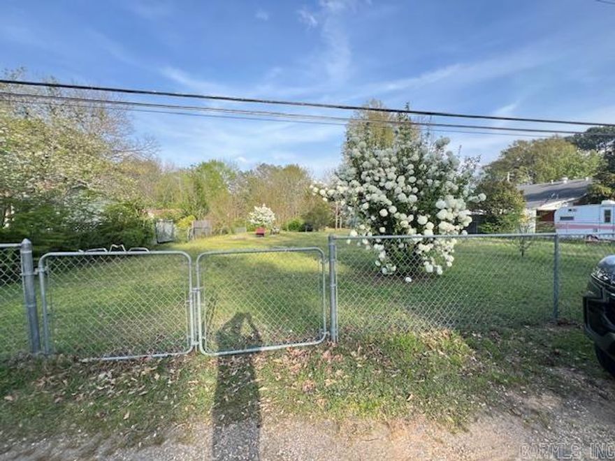 Fenced in residential lot in town just minutes from town square.
