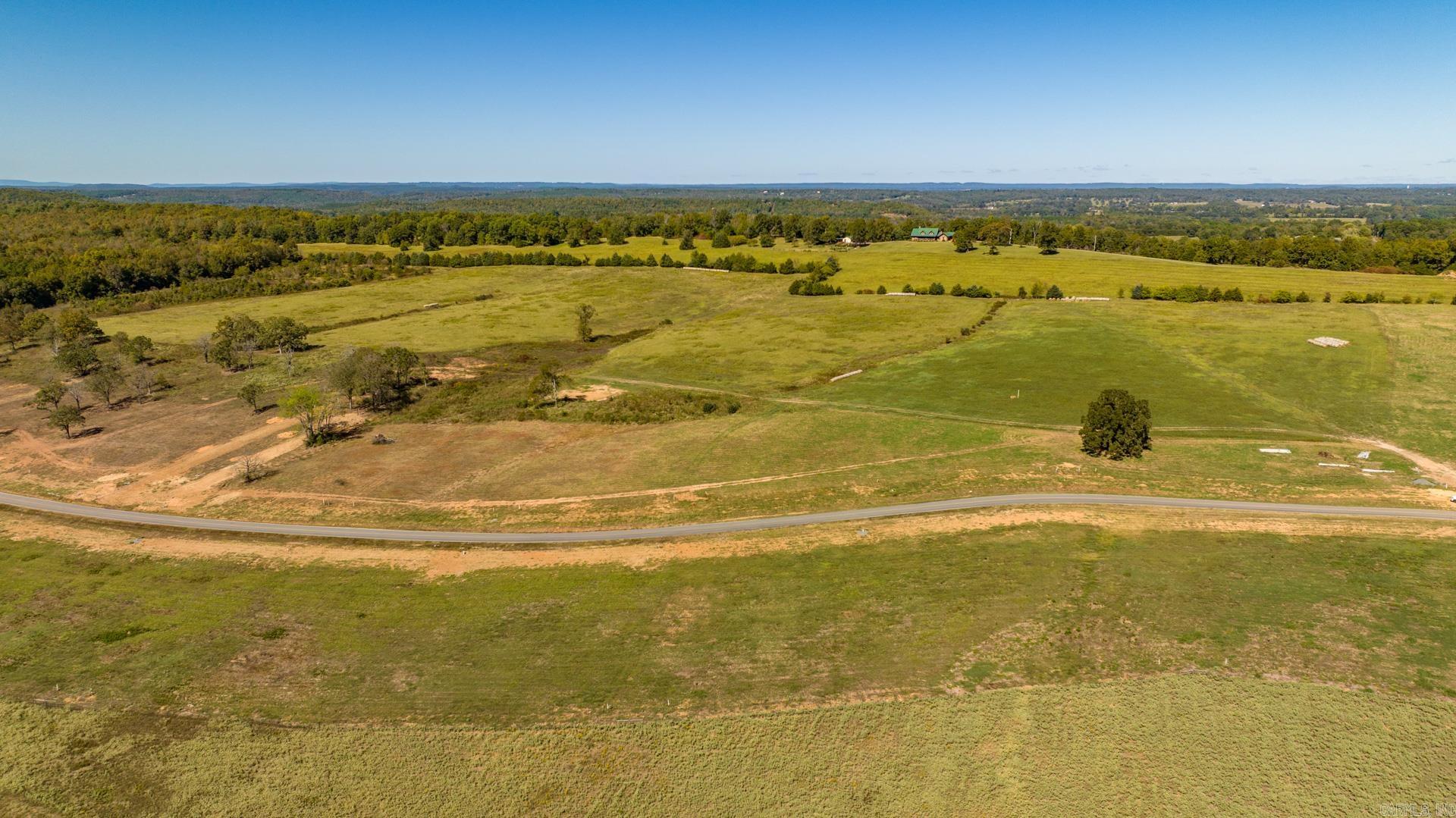 Looking for a place to build your home! You will love this spot with a view! These cleared lots have public water at the road. They will be on the Greenbrier sewer system. 2000 sq. ft. minimum. Any builder welcome.