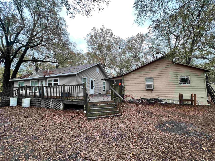 Looking for some great deer hunting property, only a few miles from the White River- here is 60 wooded acres tucked between Ulm, AR and Casscoe, AR. Schedule a tour of this hunting property with two cabins, that can sleep up to 20, a well, and established hardwood trees and trails.