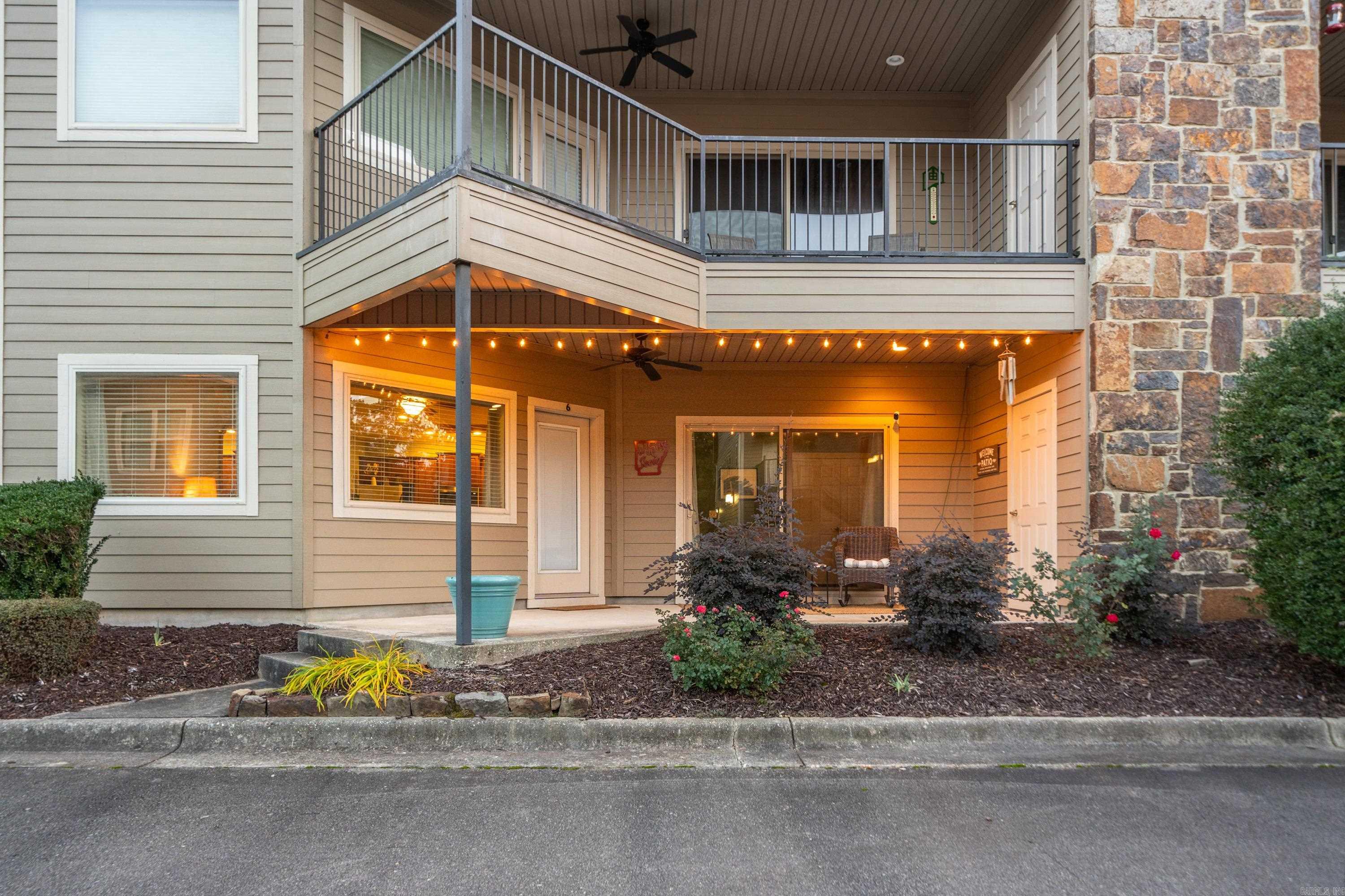 Welcome to your personal slice of paradise on beautiful Lake Hamilton! This charming walk-out level (lower unit) 1Bd/1Ba condo is located in the highly desirable Woodland HPR community just minutes from Garvan Woodland Gardens, & offers serene surroundings & low-maintenance living—all just minutes from the heart of Hot Springs. Inside this fully furnished unit, you’ll find a bright & open floor plan w/ a cozy living area, well-appointed kitchen & private patio perfect for sipping your morning coffee. The bedroom offers generous space & natural light, while the full bathroom includes updated fixtures & plenty of storage. Whether you're looking for a weekend getaway, a full-time residence, or a rental investment, this condo checks all the boxes. Woodland HPR amenities include beautifully maintained grounds, a swimming pool & lake-side boardwalk. Guests can even tie up their boats for the weekend. Enjoy the best of lake life with quick access to dining, shopping, Oaklawn Racing Casino Resort & Hot Springs National Park.