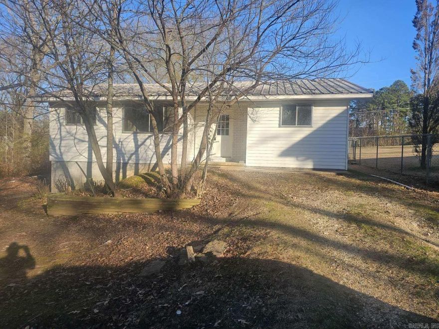 If location is what you're looking for then look no further. Located in the Bryant School District and moments from I30 this THREE bedroom, 1.5 bathroom home has updates throughout.  With new paint, trim, flooring, granite countertops, SS Appliances, faucets, light fixtures and much more this house has a fresh new look. The living area has built in shelving and a huge window that flooded the space with natural light.  The spacious kitchen/dining area is perfect for entertaining and has a french door that leads out to the backyard.  This affordable Saline County home won't last long. This property is FHA available after 1/17/2024 No Seller Property Disclosure available.