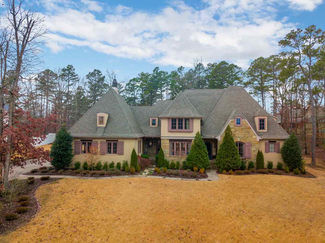 Fabulous Southern French Style Home w/ access & partial view of the Chenal golf course. Enter into an amazing living room w/ vaulted cedar beam ceilings, stone fireplace & hardwood floors throughout the home. Formal dining, office w/ built ins or can be used as a sitting room. Gourmet open kitchen w/ large island, viking appliances & slab granite. Outstanding master suite w/ an ensuite bathroom. 3 beds & media room up, outdoor kitchen w/ granite counter, stone patio, new pergola, & landscaping. 3 car garage