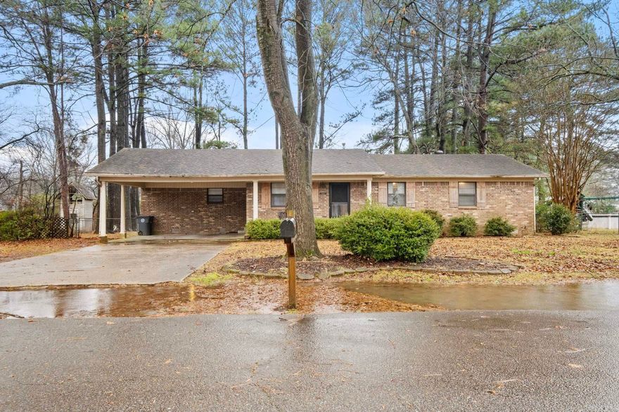 This 3 bedroom 2 bath home has been recently updated (to include ALL NEW SUBFLOORING) and more! It is absolutely stunning and ready for a new family! Open concept with a large kitchen, dinning space and living room area. Separate laundry room, tiled walk in shower, large closets and so much more! Sunroom that is perfect for peacefully sipping your coffee or hanging out with friends! Extra covered patio.  Very large backyard that is completely fenced. Shop has electricity. Do not miss this one! Call for your personal tour today!!