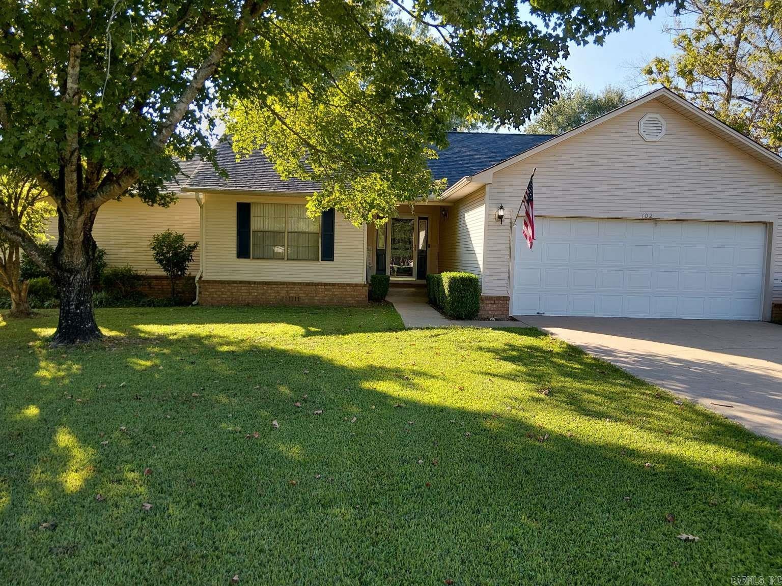 3br2.5b well maintained home on beautiful sloping lot. No stairs down to boat dock and yet itās out of the flood plain! New roof Sept 2025 with transferable 2 year warranty. New granite countertops in kitchen. Newly refurbished covered/uncovered back deck. Beautiful wood boat dock with 6 ft platform and tritoon lift. Sit right on the boat dock and fish the bream bed in your bay. Watch the wildlife in the quiet neighborhood and be in Hot Springs in 5 minutes. Large 24x35 detached shop with 2 bays, 2 workshops, and 24x15 covered patio on lake side of shop. 10x20 storage shed.