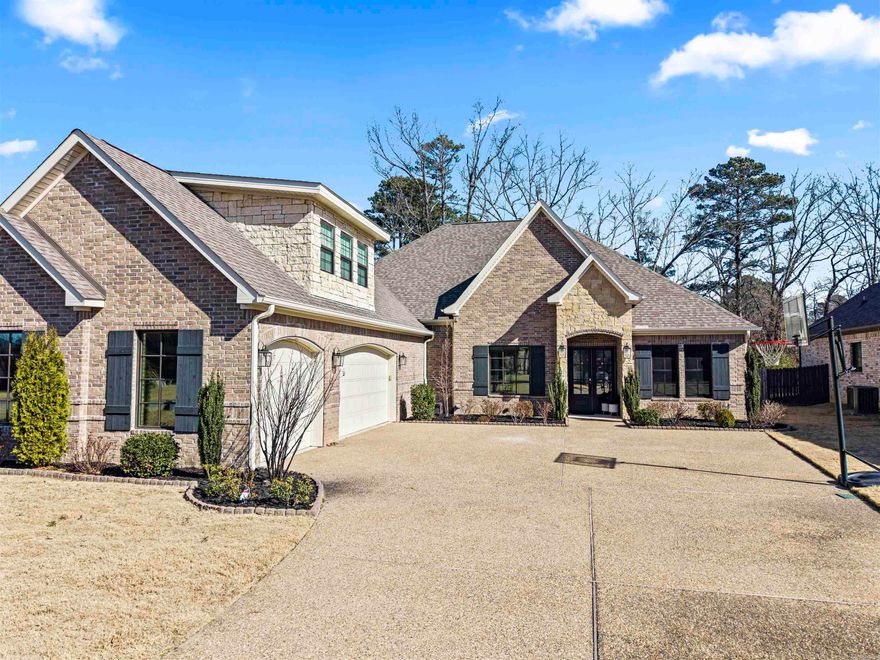 Welcome to refined living in the heart of Hot Springs, perfectly positioned next to Hot Springs Country Club and within the highly sought-after Lakeside School District. This beautifully designed 5-bedroom, 4-bathroom home offers 3,340 sq. ft. of thoughtfully curated space, blending elegance, comfort, and everyday functionality. From the moment you step inside, you’ll be drawn to the open-concept living areas, soaring ceilings, and warm wood accents that create an inviting, upscale atmosphere. The chef’s kitchen shines with an oversized island, custom cabinetry, and premium finishes; ideal for hosting everything from casual mornings to unforgettable gatherings. The spacious primary suite is a true retreat, featuring a spa-inspired bathroom with a soaking tub, walk-in shower, and multiple generous closet spaces. Additional bedrooms offer flexibility for family, guests, and a home office, while beautifully designed bathrooms add a touch of luxury throughout. Step outside to your private backyard oasis, where a sparkling in-ground pool, outdoor kitchen and covered patio set the stage for summer entertaining, weekend relaxation, and peaceful evenings under the stars.