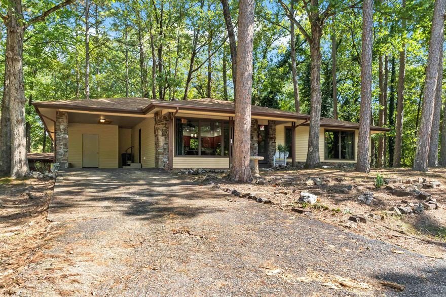 Tucked on a spacious corner lot, this property blends modern updates with cozy charm. Among the key Features are ALL newer windows (2024)!  Stylish stainless-steel appliances in the kitchen updated in 2024. Updated baths! Newly installed LVP and vapor barrier 2024.  Open floor plan with a generously sized family room/den and a classic wood-burning fireplace. INSIDE oversized storage room—perfect for an extra refrigerator, freezer or the pantry that you've always dreamed of having! (measures 19' x 5'3") Fenced backyard ideal for pets, play, or gardening.  Time to embrace the Village lifestyle. This home offers both function and warmth. Your future starts here.