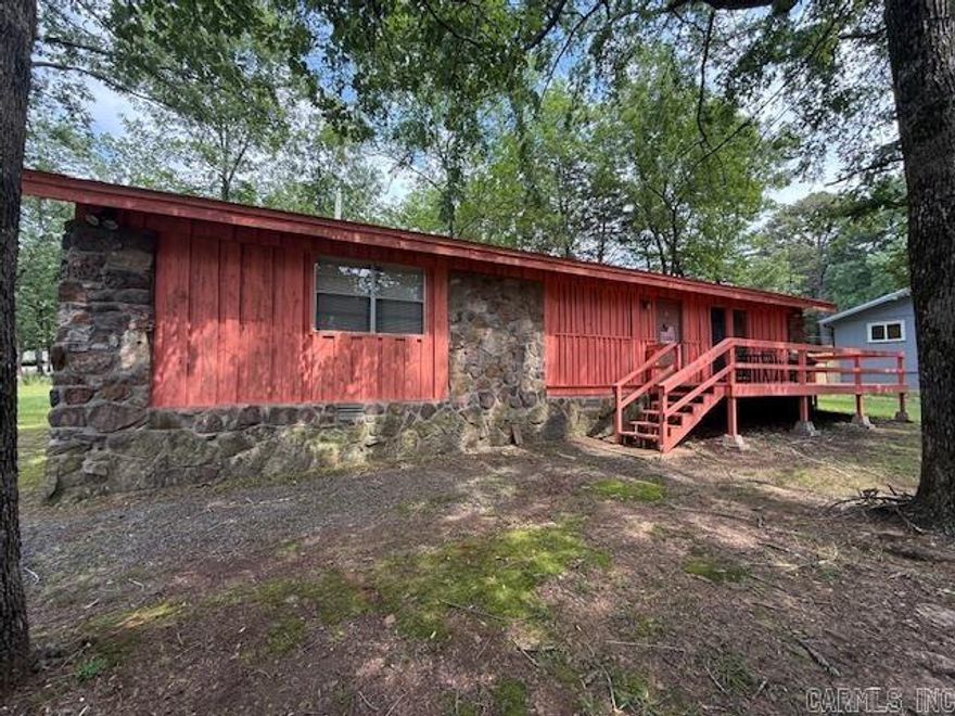 A PLACE FOR THE FAMILY AND INCOME, TOO! Your golden opportunity to own a home less than 5 minutes from DEVILS FORK PARK and access to beautiful GREERS FERRY LAKE! This ADORABLE and AFFORDABLE 2-bedroom, 2-bathroom home had new shingles installed in the spring of 21'. Open concept floor plan, with access to your oversized back deck AND side porch from the living and dining room make entertaining fun and easy! Both bedrooms offer plenty of room for play and sleep. Some updates include updated flooring, paint and hot water heater. Nicely situated on a LARGE corner lot that provides ample room to park your boat. WELL WORTH THE CALL if you are looking for a seasonal retreat or low-cost living.