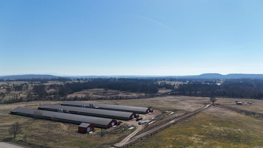 Turnkey poultry operation, 3, 50’x500’ up to date turkey houses on 35+/- acres just north of Branch, Ar. Built in 2018, under contract with Butterball LLC. Approximately 23+/- acres of flat hay ground surrounds the poultry houses. The southeast portion of the property consists of a hillside with a small pond. The owner sees multiple deer on the property throughout the day. Perry creek runs through the property from north to south.  Also included in the sale is a John Deere 5050E with loader, Priefert Litter Saver, KMC Poultry House Cleaner 4250,125KW backup generator with 500 gallon fuel tank,Natural Gas fired incinerator, radiant heaters and 10,000 gallon backup water supply.  Potential income from litter and hay sales, or start a small cattle herd. This property checks all the boxes.  Highway frontage along 398 north of Branch. 15 minutes from Paris, 42 minutes to Fort Smith and 10 minutes to Charleston.