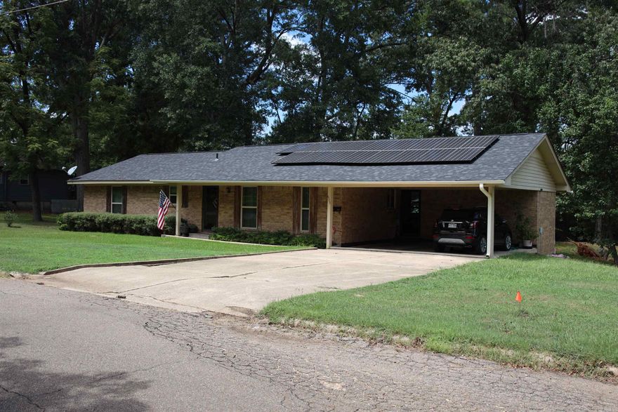This is a beautiful well maintained home. New roof, and flooring. There is a large basement with access to the small back yard.  Note: Solar panels "WILL BE" included in the sale.