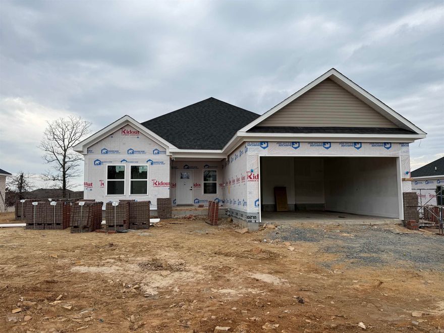 NEW CONSTRUCTION HOME! Located 2-3 min from 67/167/I57! This new construction home is in a new neighborhood & soon to be ready for a new family! This home is ideal for someone living & working in the greater Cabot area, commuting to LRAFB, commuting to Conway, commuting to Searcy or elsewhere! Entering the homes foyer you see the living room ahead of you w/9' tall ceilings. This is an open concept home w/a split floorplan. The kitchen, dining & living room provide an ideal home for entertaining & making memories! The Master Bed & Bath & Laundry are located on the right rear of home. Laundry connects to Master Bath making this easy to move clothes to your bedroom too! The other three bedrooms are located on the left of the house as well as the guest bathroom being located in the left center of the home. These homes are fantastic homes for most all budgets whether a first-time home buyer, a first upgrade home or retirement home to downsize. Not to mention this home is also 3-minutes to the Cabot Schools Pre-K North and 9-minutes to Greystones Cypress Creek Golf Course too! Fantastic location & fantastic home! Do not miss out! Projected Finish Mar 2026. See Agent Remarks.