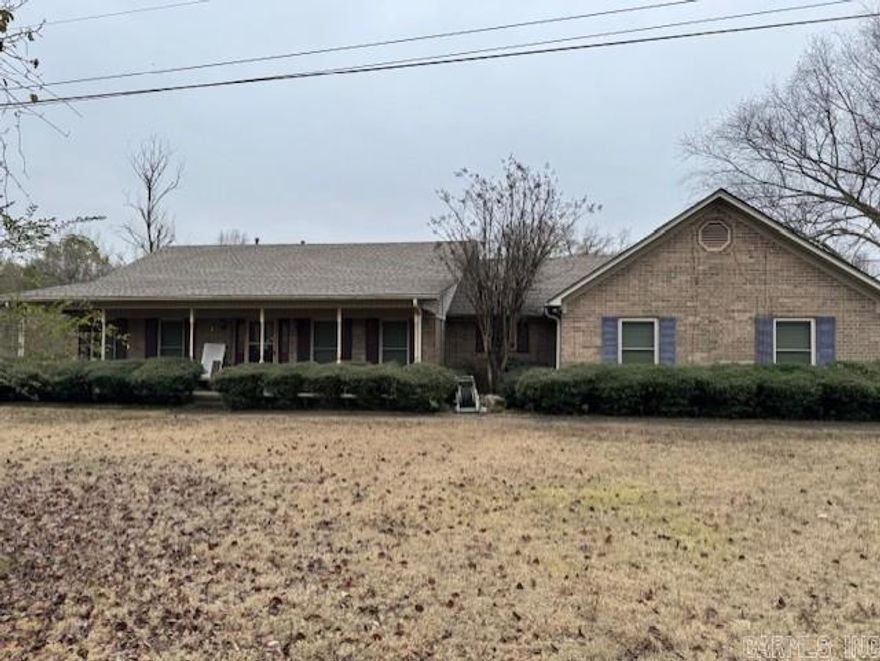 Great home on 6 level acres, fully fenced with an extra 20'9x20'9 -2 car garage, 30x30 shop & storage building. There is a 40' RV cover with extra parking. House has 3 bedrooms, 2.5 baths sunroom. Large great room, separate laundry, eat-in kitchen. Sold AS-IS, no repairs.