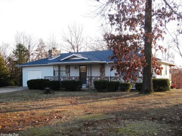 MOVE IN LOW MAINTENANCE 2 Bedroom 2 Bath home on city sewer. Living room F/P with insert and blowers, kitchen has breakfast bar and space for small table or extra storage cupboards. Dining area with sliding doors on to the 7x33 deck. Master bedroom w/walk in closet, master bath has shower stall. Front bedroom with large walk in closet and shades on windows that block out all the sun. 4x6 laundry off the kitchen with entry from the garage. Storm room bolted do floor in the garage. New roof 2013 flooring 12.