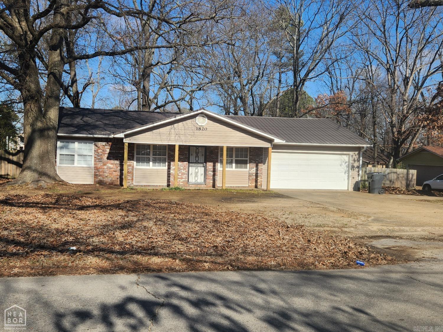 This 3 bedroom/2 bathroom house is a must-see! All of the bedrooms are spacious and have good closet space! The entire house has new flooring including the bathrooms which has new tile. This house has a great living area along with a formal dining room, great size kitchen, and a laundry room that has tons of cabinets space! Stainless appliances include range and vent-a-hood microwave. The backyard is fenced in and has a nice wood deck and concrete patio area! You don't want to miss out on this one!