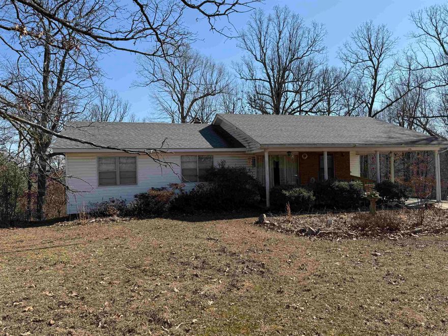 Rural country home sitting on approximately 15  acres M/L. This home has three bedrooms and one bath. This home offers a peaceful country setting with lots of potential to bring those personal updates that make a home your very own. There is a shop and several outbuildings. Across the street is a fenced in garden area, which allows you to have peace of mind that the deer and rabbits will not be enjoying your garden more than you do! There's also a special very old primitive cabin that is being  protected under a barn to help preserve this part of history. If you are looking for a home with acreage on beautiful Crowley's Ridge give us a call and check ALL this home has to offer!