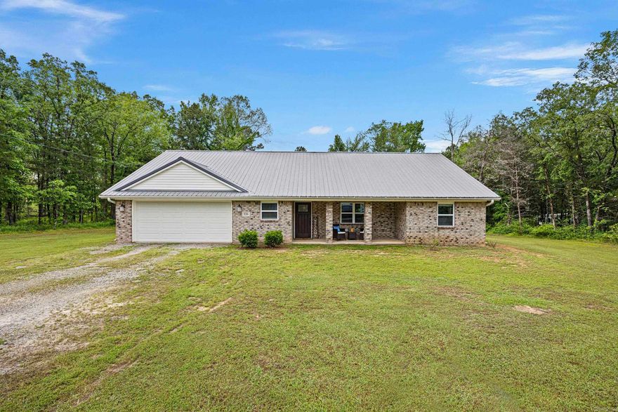 Beautiful Modern Home on 1.5 Acres in London, AR!  Built in 2020, this stunning 1,760 sq ft home offers an inviting open-concept floor plan with room to entertain. Featuring 3 bedrooms, 2 bathrooms, and a spacious master suite with walk-in closet, this home combines comfort and style. The large kitchen is perfect for hosting gatherings with friends and family, while the fenced backyard provides a safe space for kids or pets. Enjoy the peace and quiet of rural living at its finest, all while having plenty of room to grow on your 1.5-acre lot. This is the perfect blend of modern living and country charm — move-in ready and waiting for you!